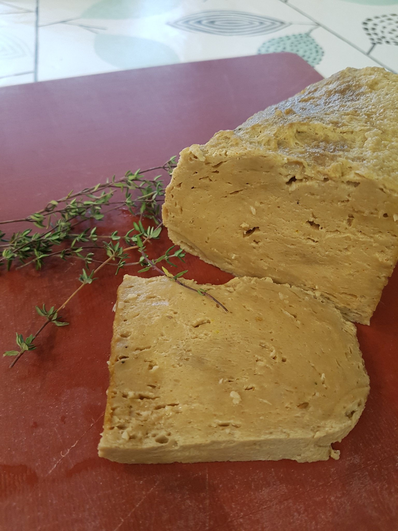 Home made seitan with branches of thyme
